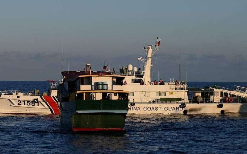 image for Filipino soldiers had to use their bare hands to fight off Chinese coast guards with swords, a general said