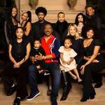image for Eddie Murphy posing with 9 of his 10 children on Christmas Eve, 2019