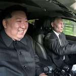 image for President Putin taking the driver's seat of the car he presented to Comrade Kim Jong Un as a gift