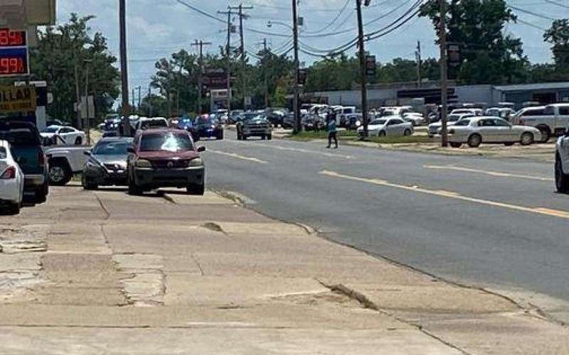 image for 3 killed, 10 wounded in mass shooting outside Arkansas grocery store