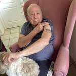 image for 82 year old showing the tattoo he got when he was 12