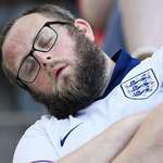 image for England fan falling asleep due to their lacklustre performance vs Slovenia