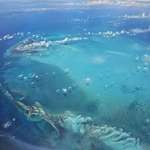image for Not one for airplane window pics, but this was off of Nassau and I thought wow