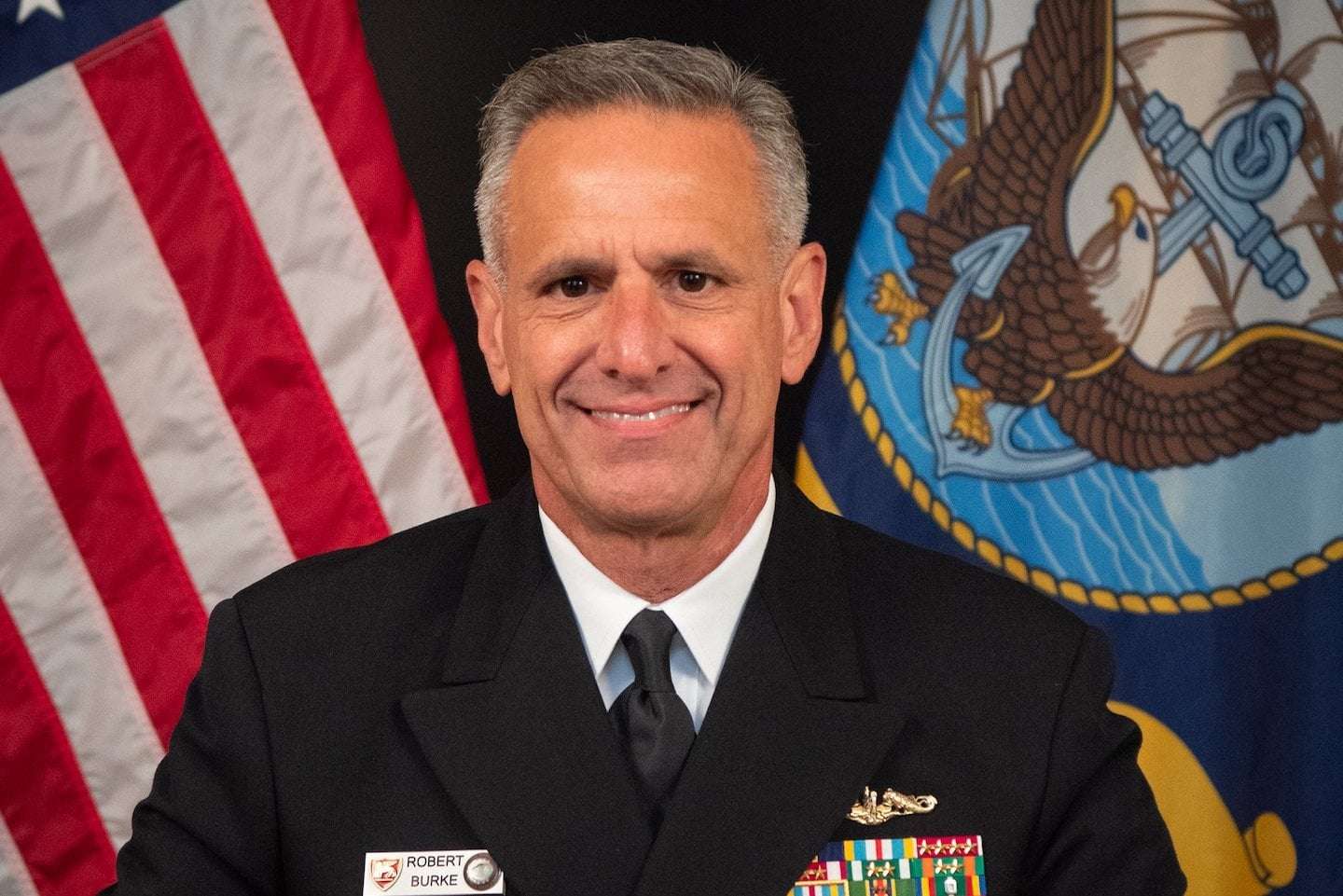 image for CEOs charged with top Navy admiral fight U.S. bribery allegations