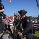 image for US Secret Service’s rush the stage following a gunfire at Donald Trump during his campaign rally.