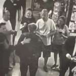 image for Rudy Giuliani being taped on the back by an employee. Rudy claimed this could’ve killed him.