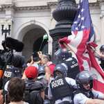 image for US Park Police defending the American flag outside of Union Station during recent protests