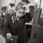image for My son as the ring bearer, filled with dread for having to get up in front of people.