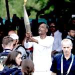 image for Snoop Dogg carried the Olympic torch in Saint-Denis