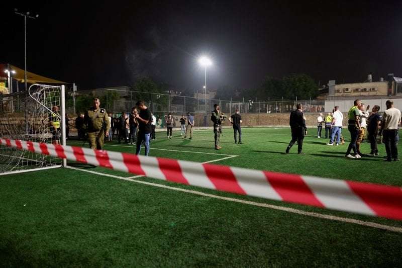 image for Israel says Hezbollah rocket kills 12 at football ground, vows response
