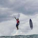 image for Gabriel Medina at the Olympics after riding a nearly perfect wave. Photo taken by Jerome Brouillet
