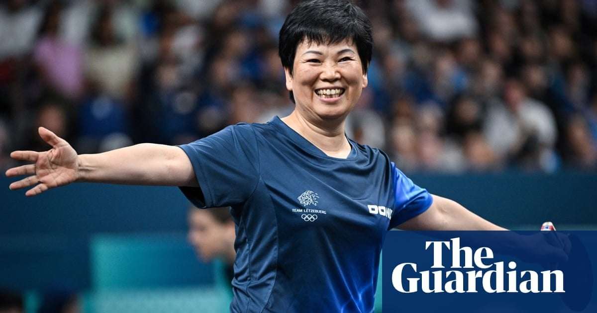 image for ‘Auntie’ Ni, 61, beams as she bows out to Olympic table tennis champion