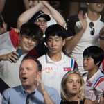 image for Spotted this kid taking a selfie with a North Korean, as if they are celebrities.
