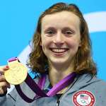 image for Katie Ledecky, 15, celebrating the first of four straight 800m Gold Medals at the 2012 Olympics.