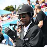 image for Snoop Dogg watching dressage at Paris Olympics