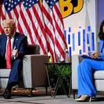 image for Rachel Scott looks away as Trump speaks at the National Association of Black Journalists