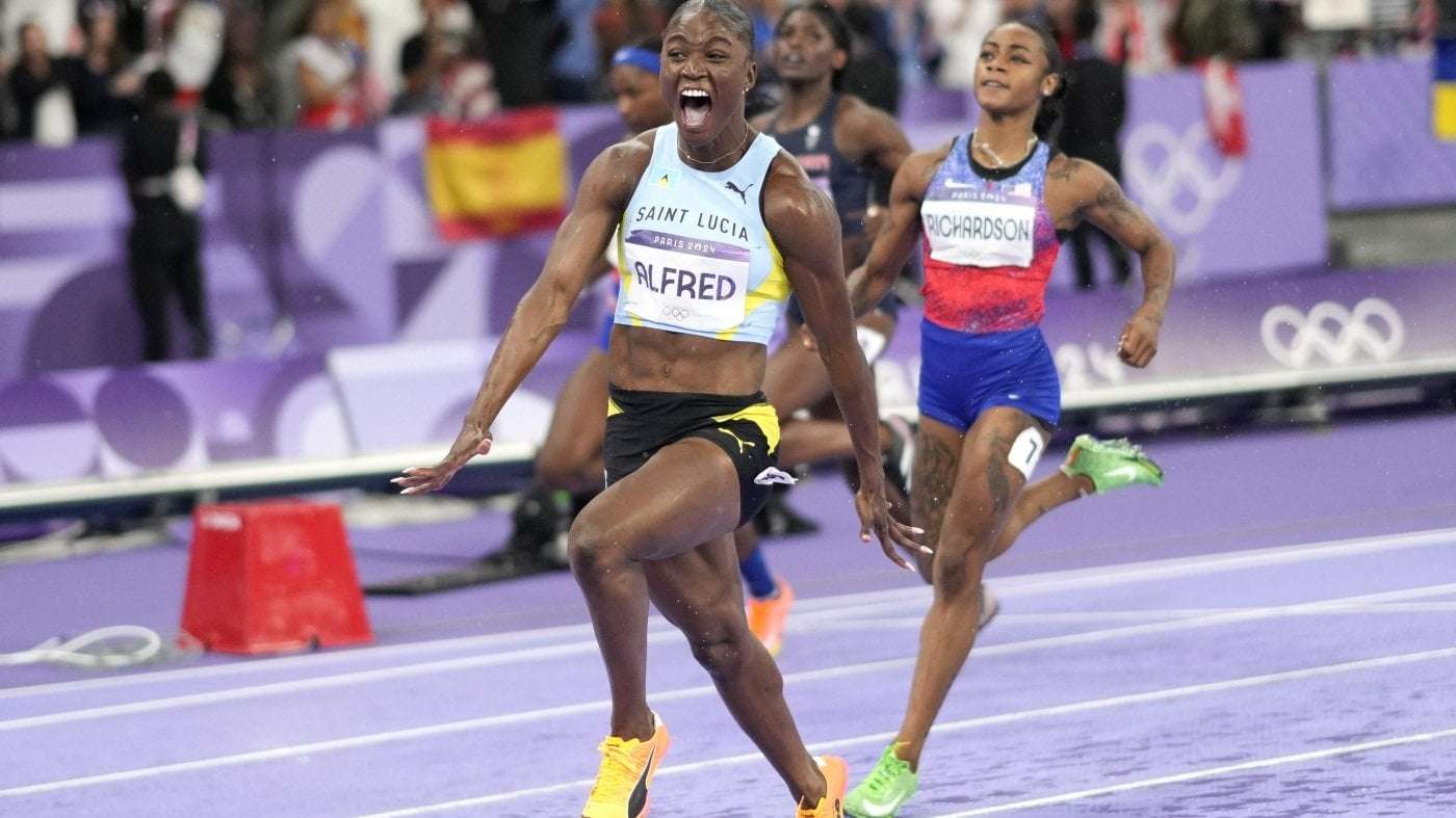 image for Julien Alfred stuns Sha'Carri Richardson in 100m to win St. Lucia's 1st Olympic gold