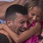image for Novak Djokovic hugs his daughter after winning his first gold medal at the Olympics.