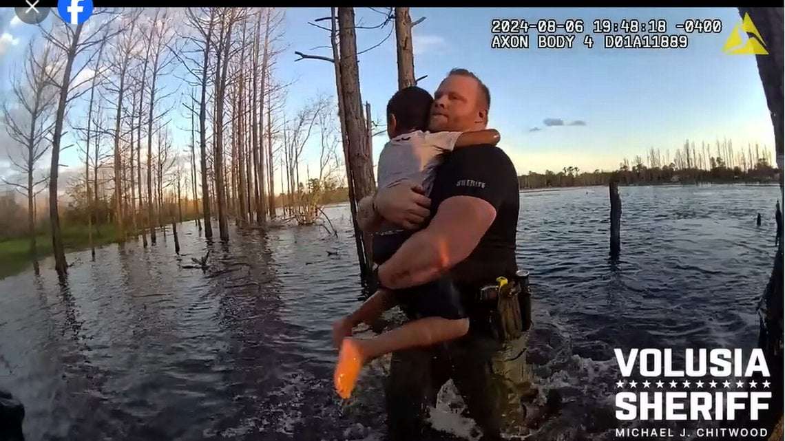 image for Missing 5-year-old boy found desperately clinging to log in pond, Florida video shows
