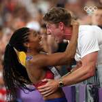 image for tara davis-woodhall with her husband paralympian hunter woodhall after winning the gold medal