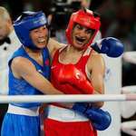image for Imane Khelif's gold medal win was followed by a warm, smiling embrace from her opponent, Yang Liu