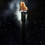 image for Alain Roche plays the piano vertically at the Paris Olympics closing ceremony