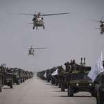 image for Taliban parade US military vehicles and weapons left behind to celebrate 3 years in power