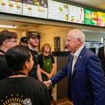 image for Tim Walz shaking hands with employees at Runza