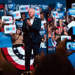 image for Tim Walz being introduced to speak at a rally in his home state of Nebraska by a former student