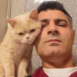 image for Olympic Shooter & Silver Medalist Yusuf Dikeç with his Cat