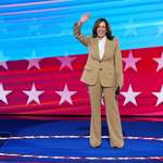 image for Kamala Harris at the DNC in a tanned suit