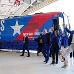 image for Kamala Harris & Tim Walz in front of “Ground Force One” the armored bus used for the campaign