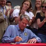 image for Georgia Gov. Brian Kemp signing bill allowing anyone to carry a concealed gun in public w/o license