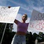 image for Woman Protests After Apalachee High School Shooting