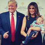 image for Trump with the "thumbs up" next to a baby who was orphaned by the 2019 El Paso, TX, mass shooting.