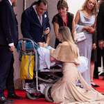 image for Angelina Jolie stops to greet a fan with a rare bone disorder during red carpet for “Maria”