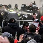 image for Pro-Trump rioters attacking Capitol police with bear spray on Jan 6th.