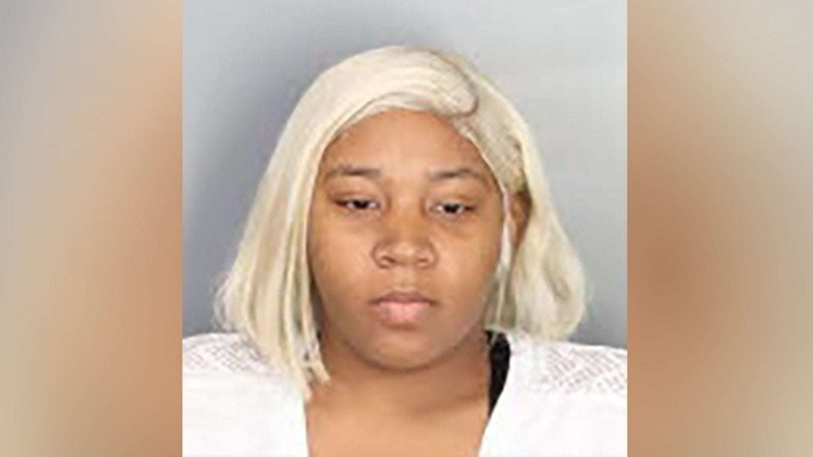 image for Mother charged after 6-year-old takes loaded gun to school