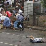 image for Japanese journalist Kenji Nagai continues to film after being shot in the heart, Myanmar 2007.
