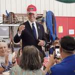 image for Joe Biden jokingly wears Trump 2024 hat after exchange with Trump supporter at 9/11 memorial event