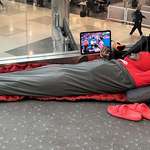 image for This man’s setup at the Denver airport.