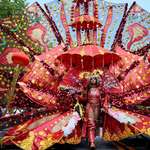 image for A woman in a costume participates in the annual West Indian American Day parade in Brooklyn