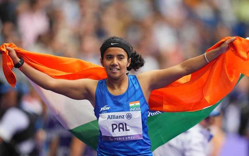image for 'Never lose courage': A Paralympian who could barely walk as a kid takes 2 track medals