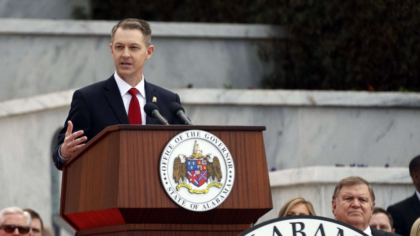 image for Justice Department sues Alabama, claiming it purged voters too close to the election
