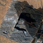 image for One of the Curiosity rover's wheels after traversing Mars for over 11 years