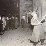 image for A Nazi officer breaking windows on Kristallnacht, ‘one really violent day’ in 1938