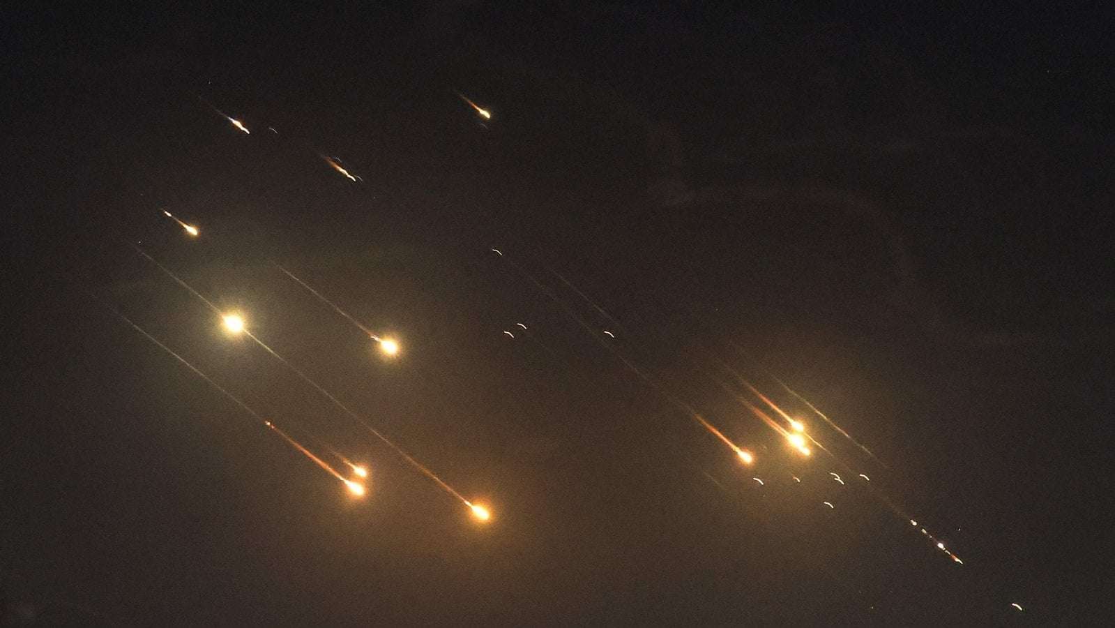 image for Israel warns of 'serious consequences' after Iran fires 200 missiles