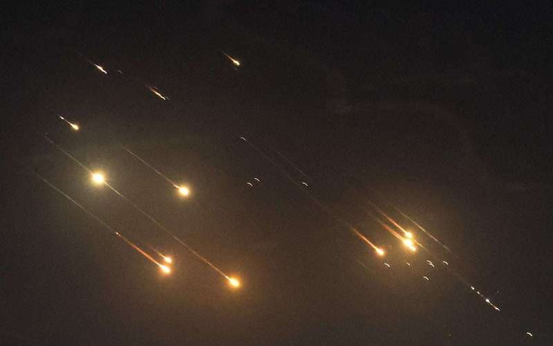 image for Israel warns of 'serious consequences' after Iran fires 200 missiles