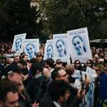 image for 2000 people gathered in Paris to hold a moment of silence for 19 year old murder victim Philippine