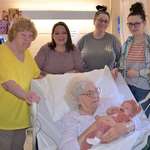 image for Six generations of women from one family taken in 2023. One month old to 98 years old.